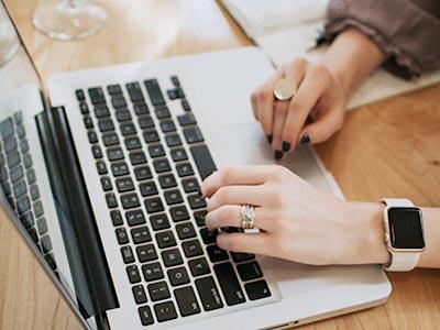 Laptop woman typing